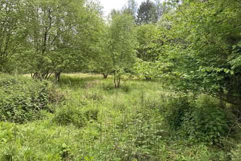 Land, in Edenham Road, £36,000