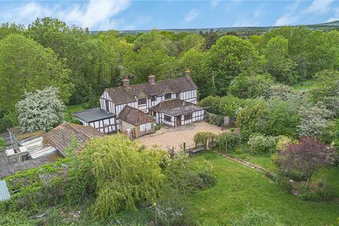 5 bed property, in Woolborough Lane, £800,000