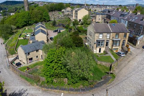 Land, in Wakefield Gate, £170,000