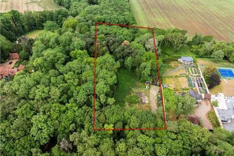 Land, in Lincombe Lane, £300,000