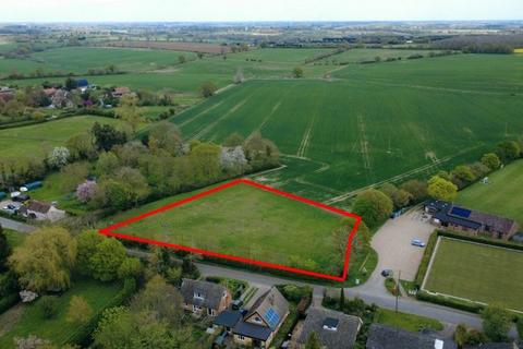 Land, in Bredfield, £500,000