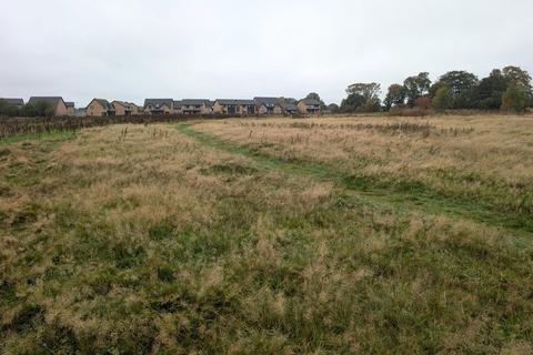 Land, in College Way, £500,000