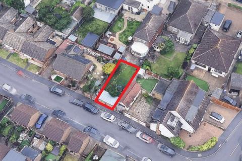 Land, in Parsonage Road, £40,000