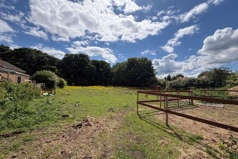 Land, in Land lying to the South East of Goole Road, £20,000