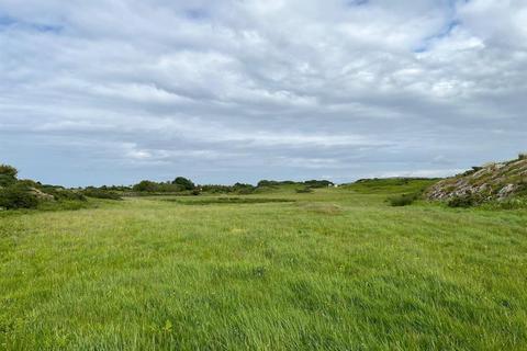 Land, in Burwen, £360,000