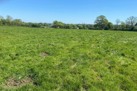 Land, in Whitehill Lane, £75,000