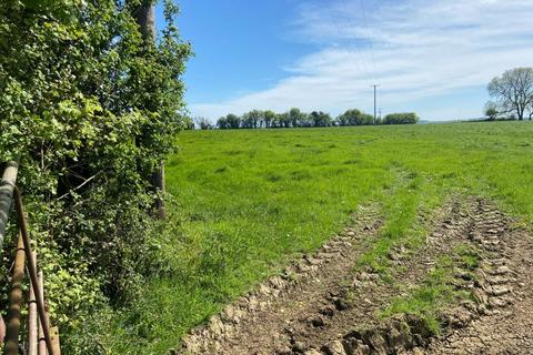 Land, in Whitehill Lane, £65,000