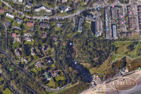 Land, in West Cliff Road, £2,495,000