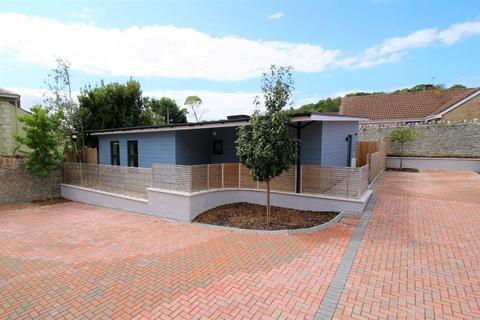 2 bed property, in Modern bungalow on Worle's hillside, £450,000
