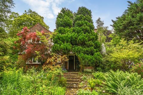 5 bed property, in Woodcote Valley Road, £1,000,000