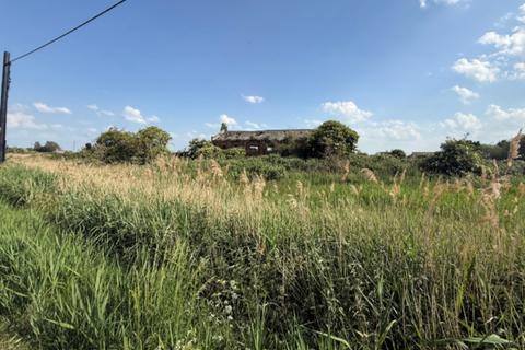 Land, in March Road, £50,000