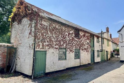 Studio, in Barns to the rear of 46 High Street, £100,000