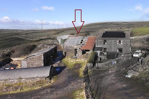 Land, in Todmorden Road, £300,000