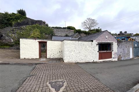 Land, in Commons Road, £65,000