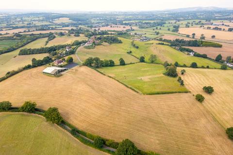 Land, in Dodford, £650,000