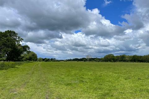 Land, in Off Station Road, £200,000
