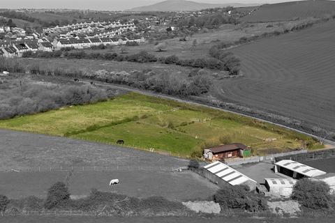 Land, in Leece Lane, £145,000