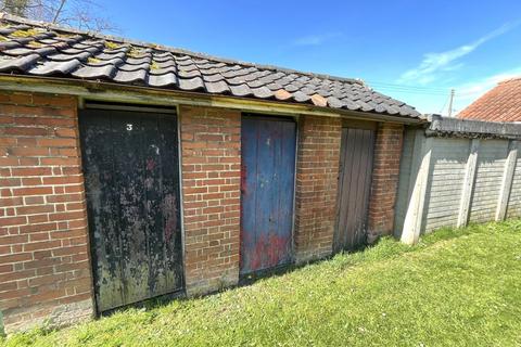 Studio, in Land and Three Sheds, £1,000