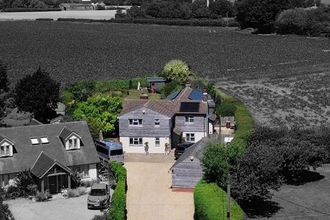 4 bed property, in Nedging Road, £700,000