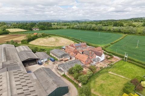Land, in Whimple, £5,000,000