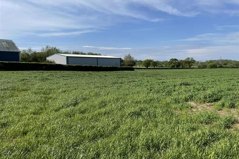 Land, in Whimple, £150,000
