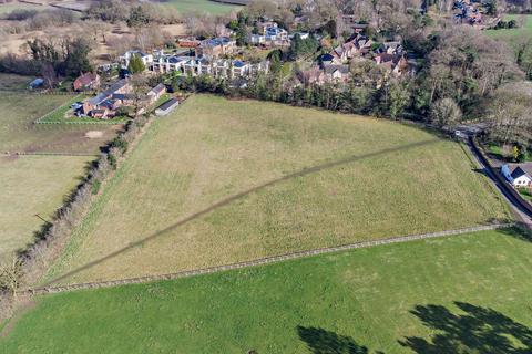 Land, in Littledales Lane, £100,000