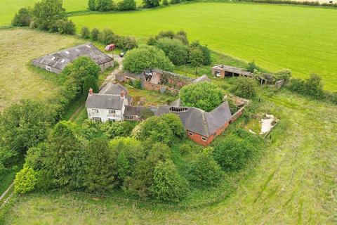 Land, in Rushlade Farm House, £1,000,000