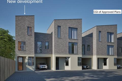 Land, in Powys Lane, £50,000
