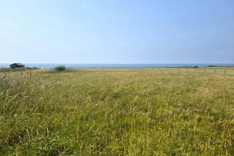 Land, in Heol Yr Esgob, £20,000