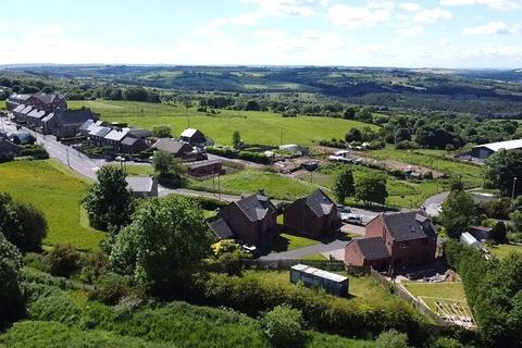 Land, in Foxes Covert, £160,000