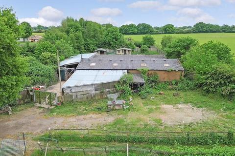 Land, in Blind Lane, £600,000