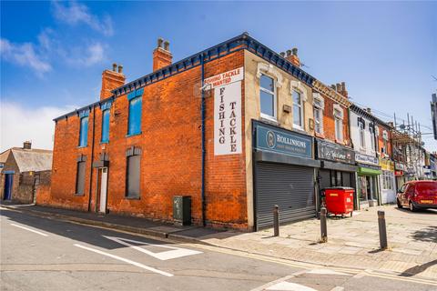 Land, in Hainton Avenue, £125,000