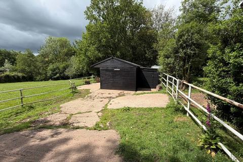 Land, in Shut Mill Lane, £150,000