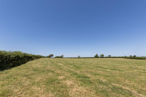 Land, in Troswell, £50,000