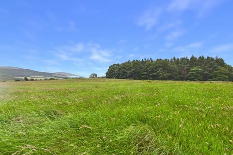 Land, in Tombain Farm, £95,000