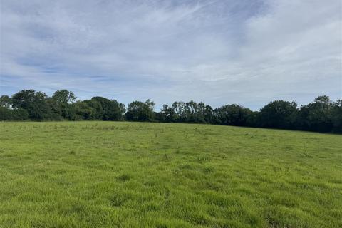 Land, in Dunkeswell, £300,000