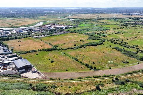 Land, in Ness Road, £10,000
