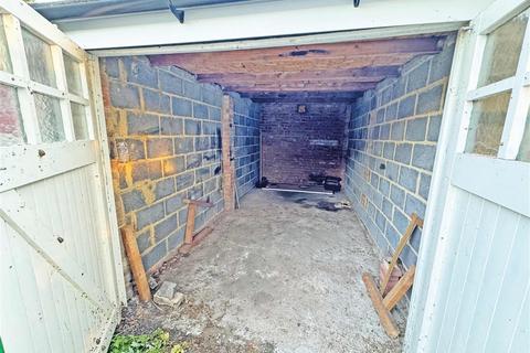 Land, in Park Road, £15,000
