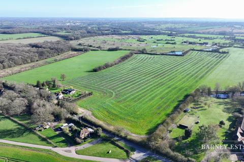 Land, in Writtle Road, £200,000
