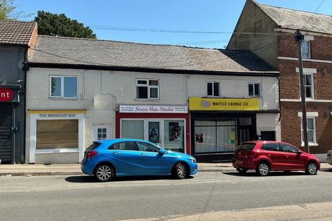 Land, in High Street, £60,000