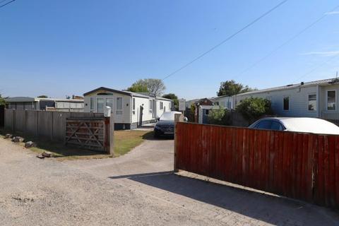 Land, in Birdham Road, £230,000