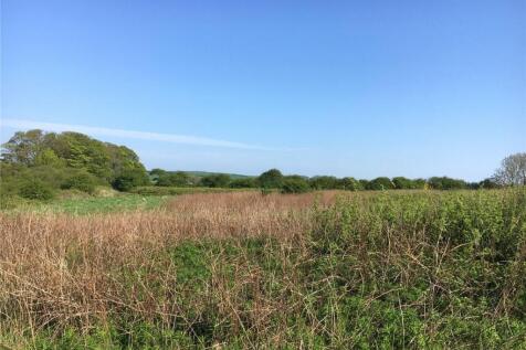Land, in Land At Woodcock Road, £1,200,000