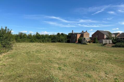Land, in Old Church Road, £350,000