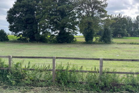 Land, in High Road, £175,000