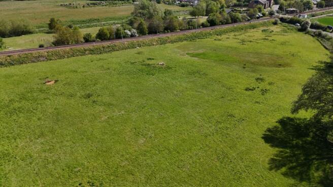 Land, in Land to the north of Ickleton Road, £125,000
