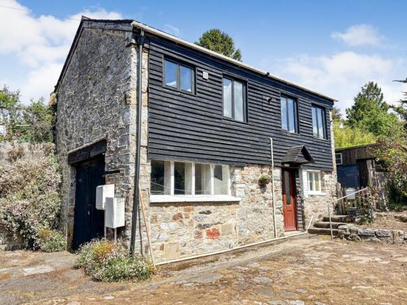 Land, in Woodland Road, £200,000