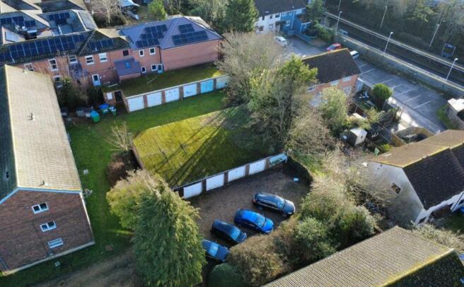 Land, in 14 Lock-up Garages Robere House, £70,000