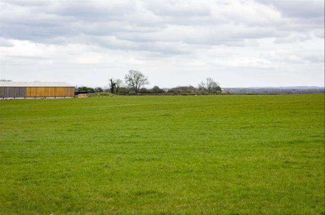 Land, in Land at Beech Farm, £130,000