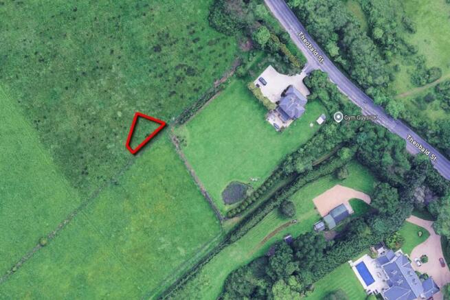 Land, in Plot 17 At Theobald Street, £3,000