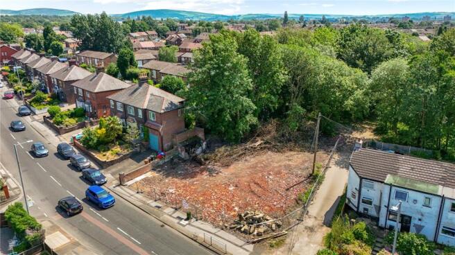 Land, in Newmarket Road, £375,000